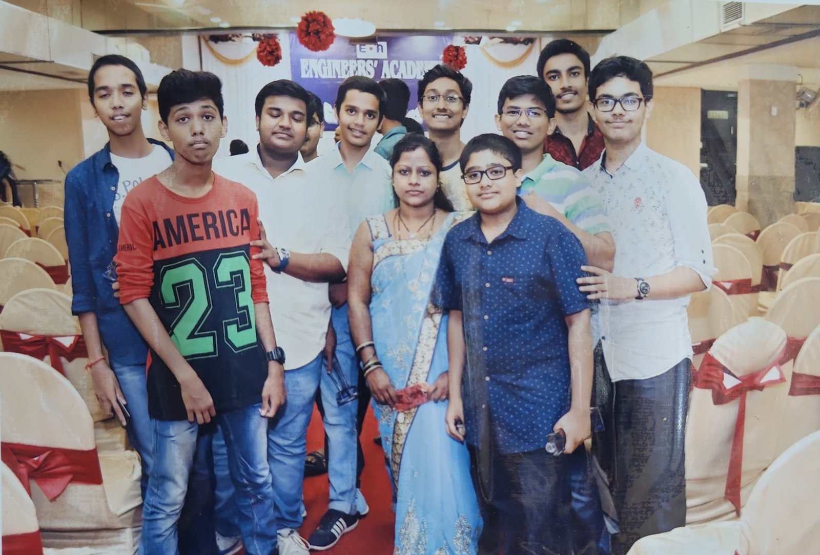 Students posing at the decorated celebration hall